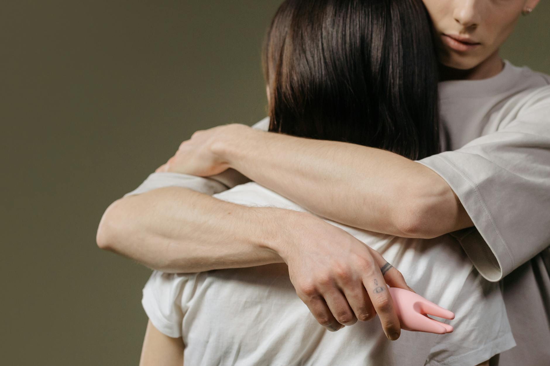 Close-up of a couple embracing, highlighting intimacy and connection after reconnecting